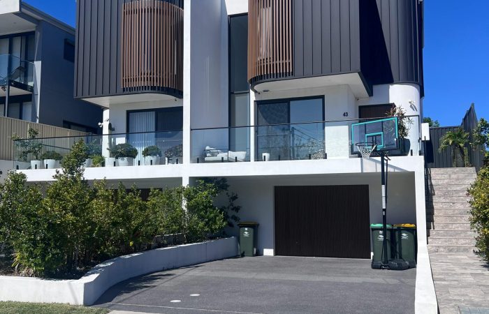 A contemporary house in Sydney featuring unique architectural design and modern amenities.